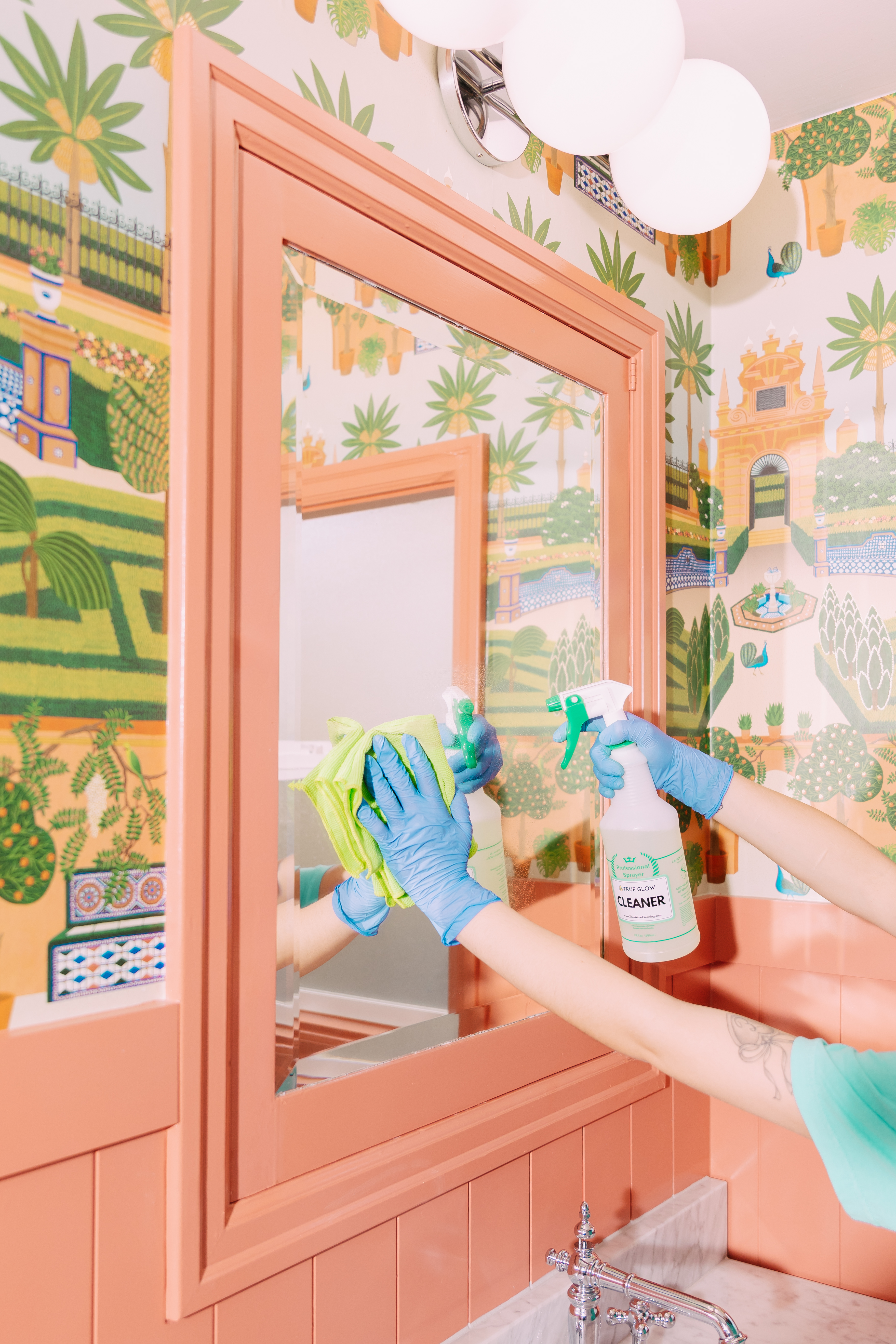 Cleaning a bathroom mirror