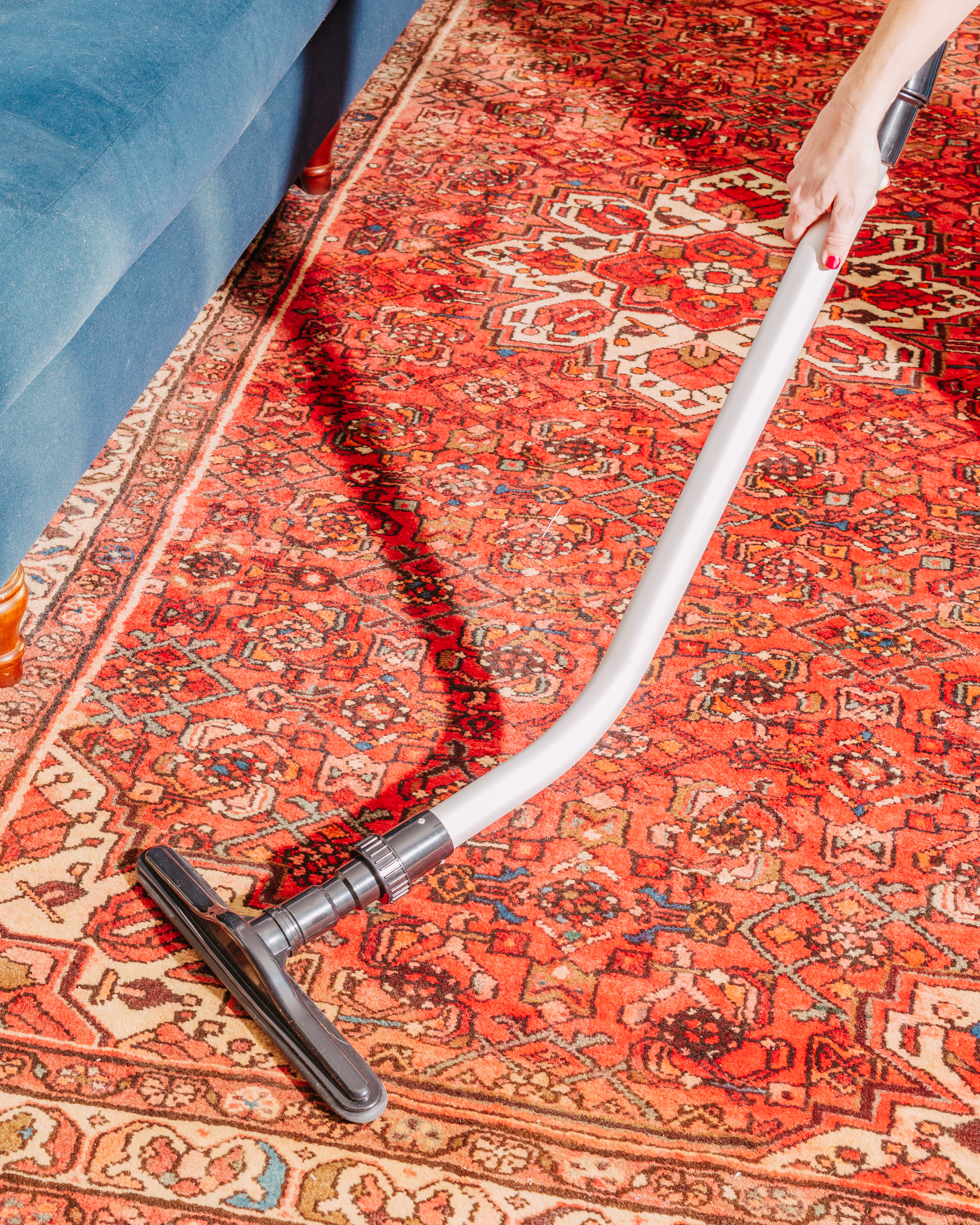 Vacuuming a rug